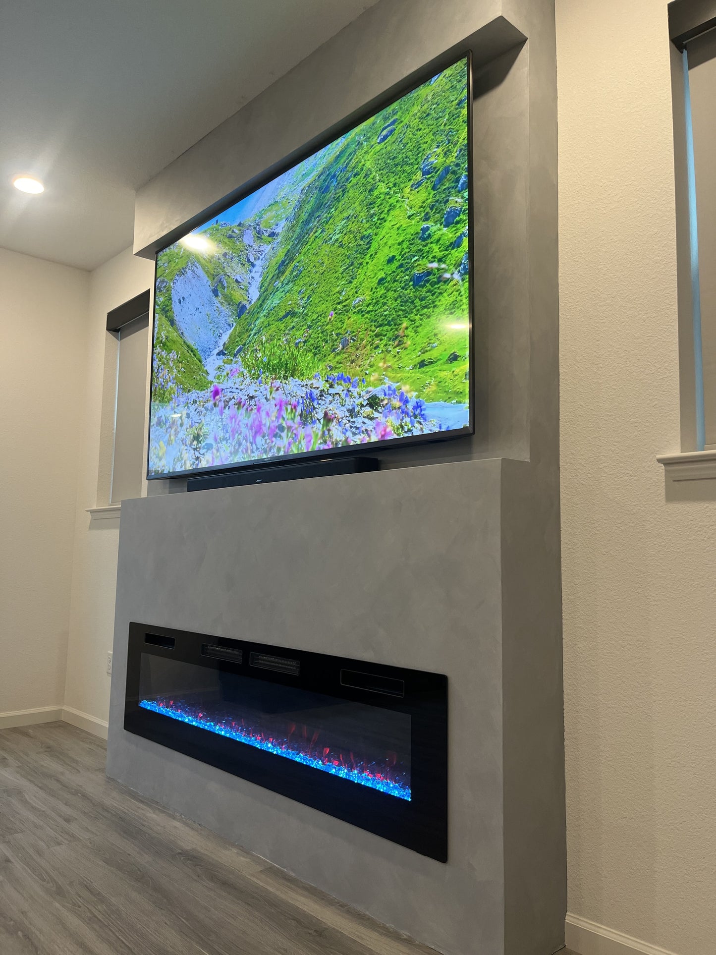 Scandinavian-style media wall with light wood finish