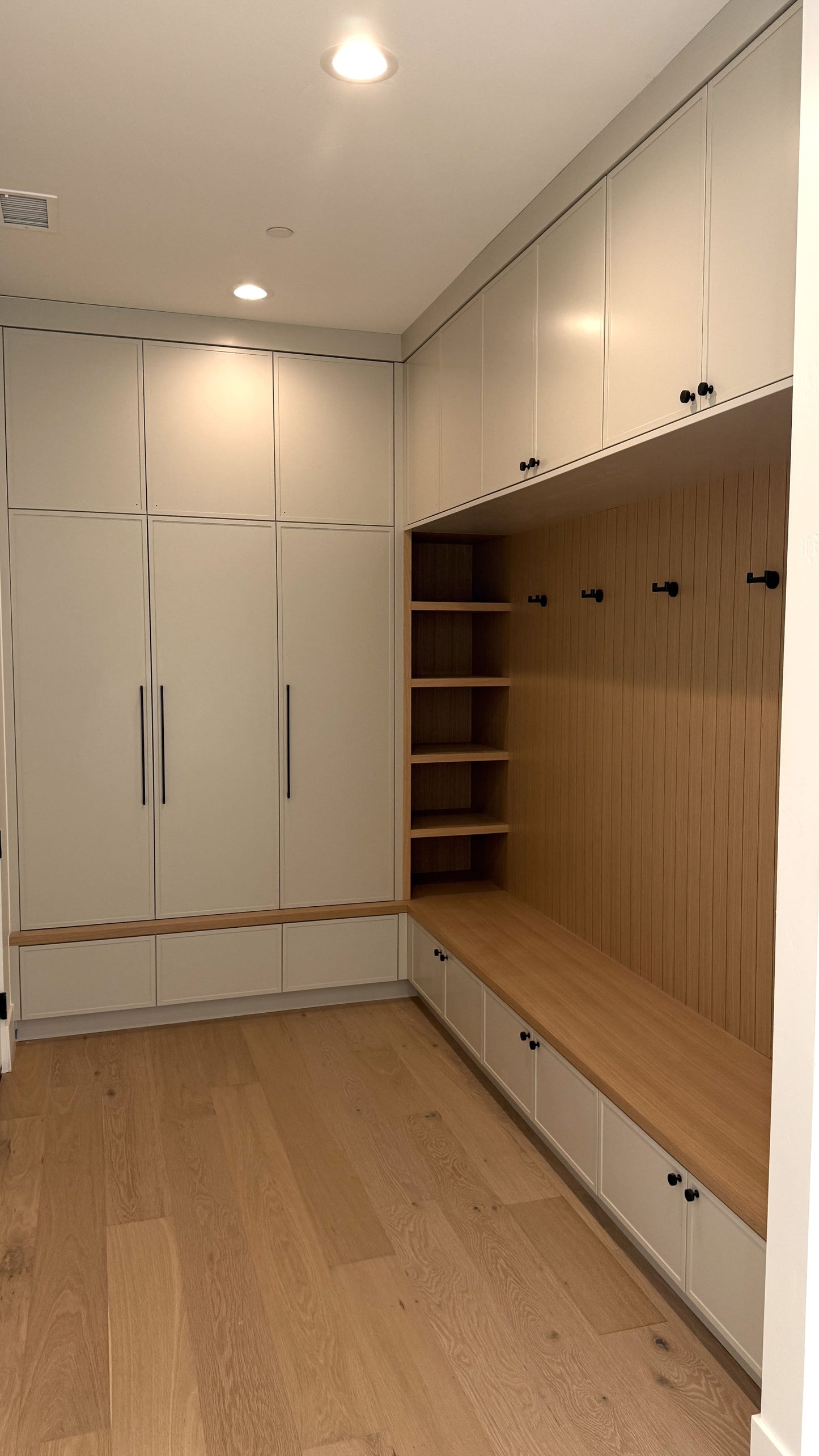 Neutral-tone cabinetry with built-in television