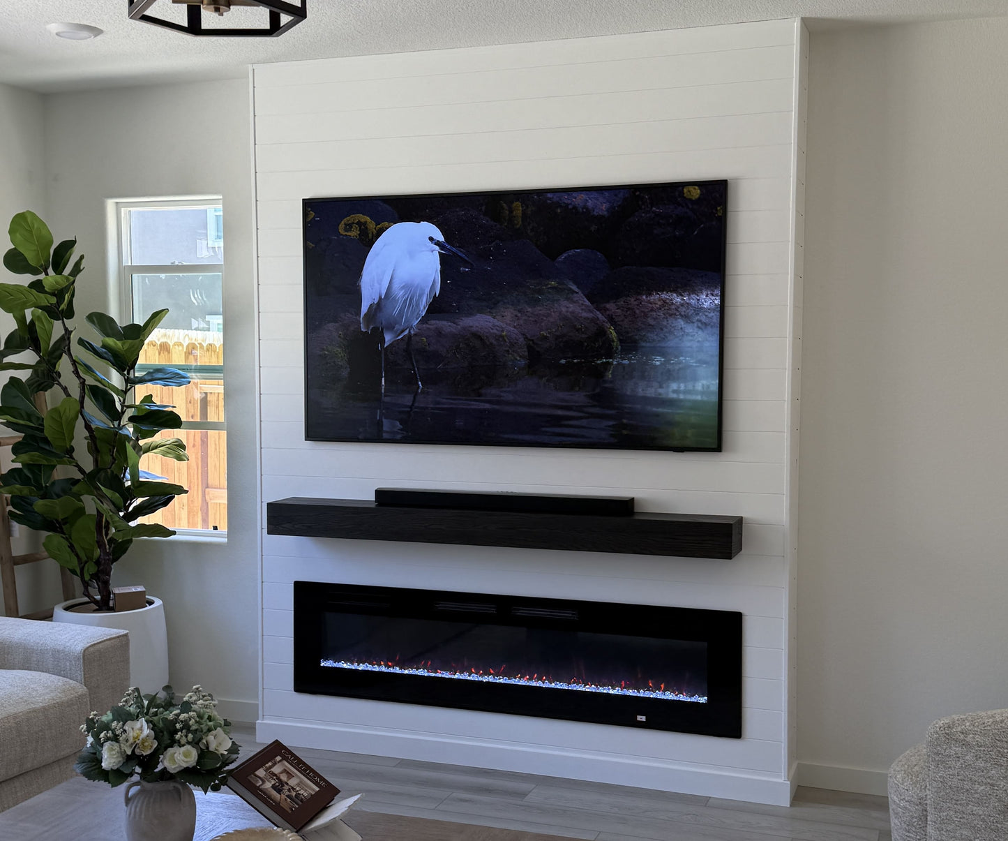 TV wall with built-in cabinets and shelving