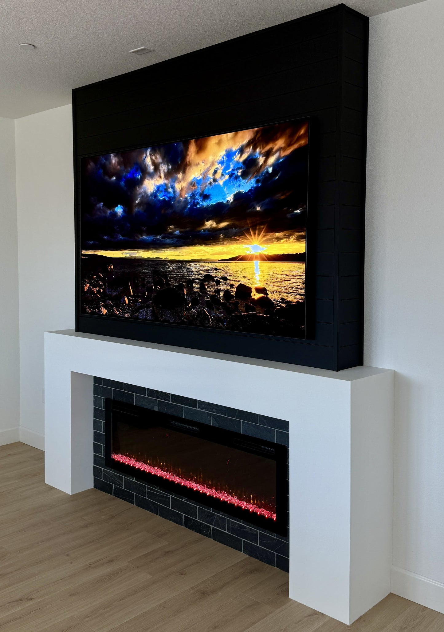 Stone-effect panel media wall with integrated TV