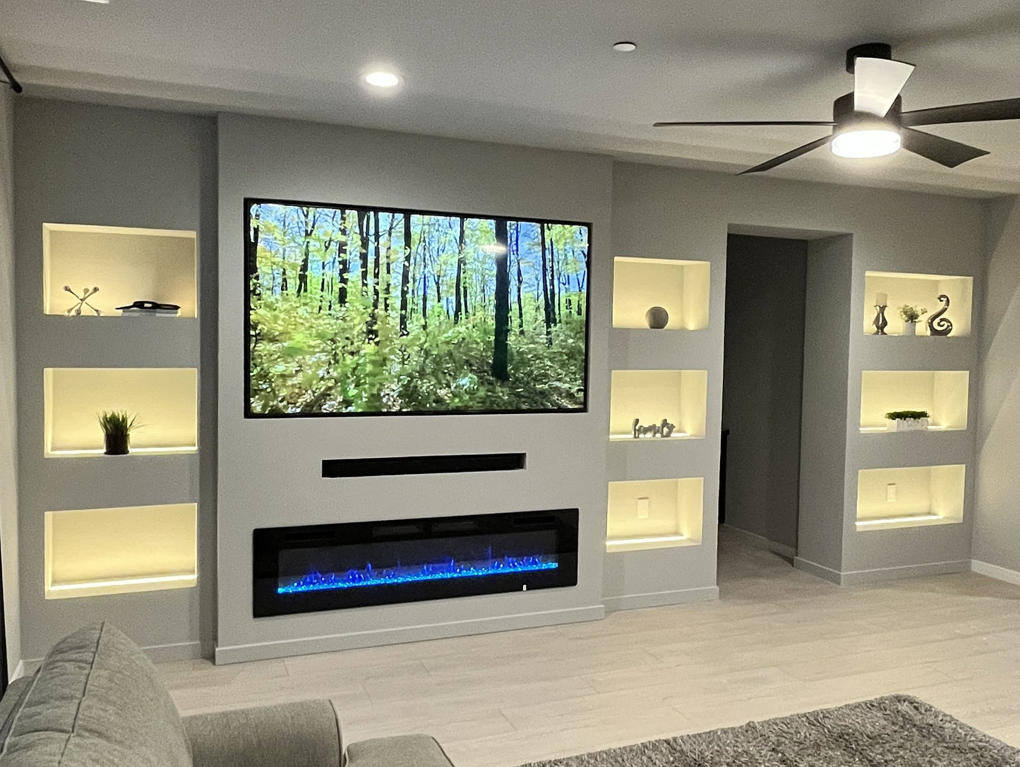 Stone-texture feature wall with built-in cabinets