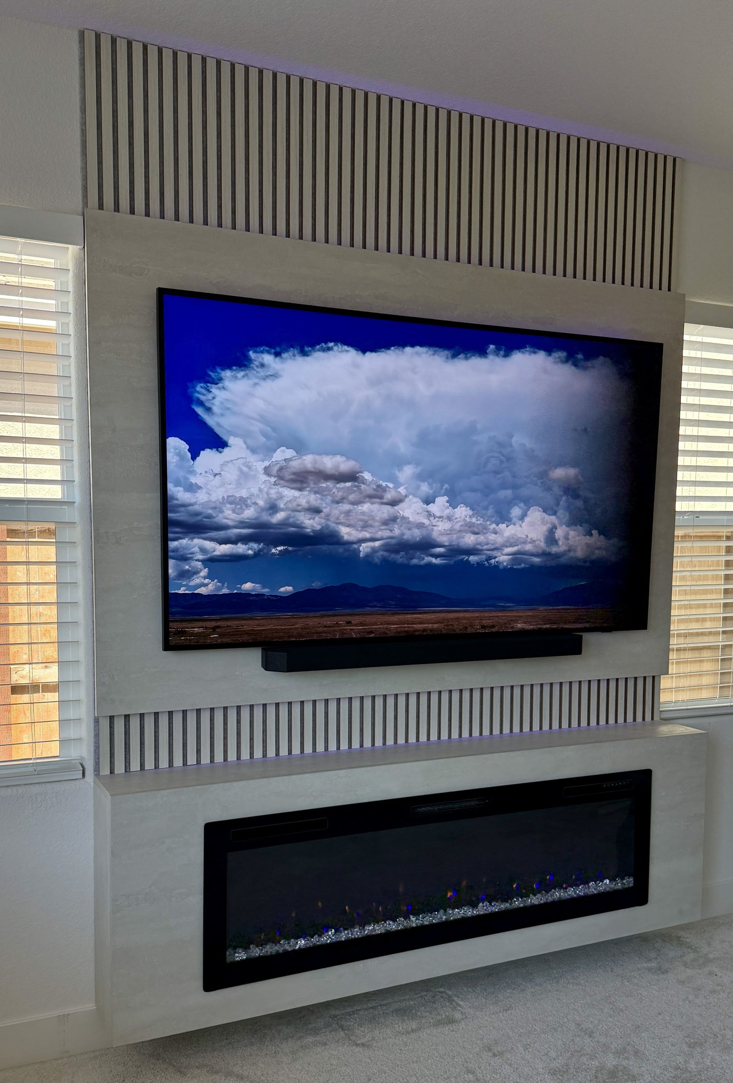 Luxury TV wall with fireplace feature