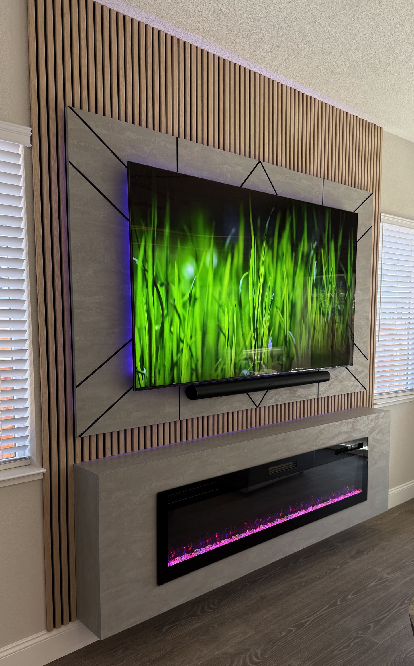 Backlit bespoke media wall with mounted TV