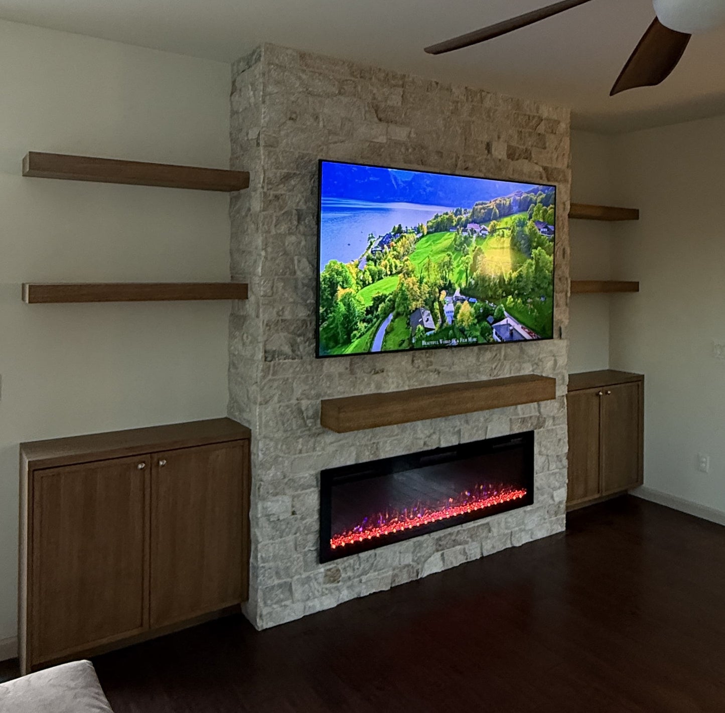 Custom oak cabinetry with integrated media wall