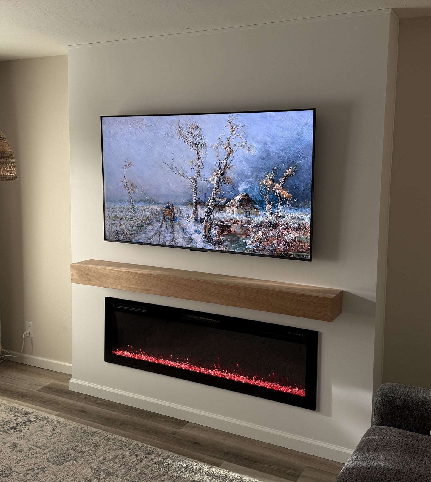 Stone-texture media wall with integrated television