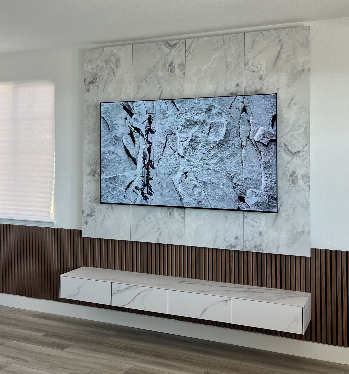 Bespoke cabinetry designed for TV zone