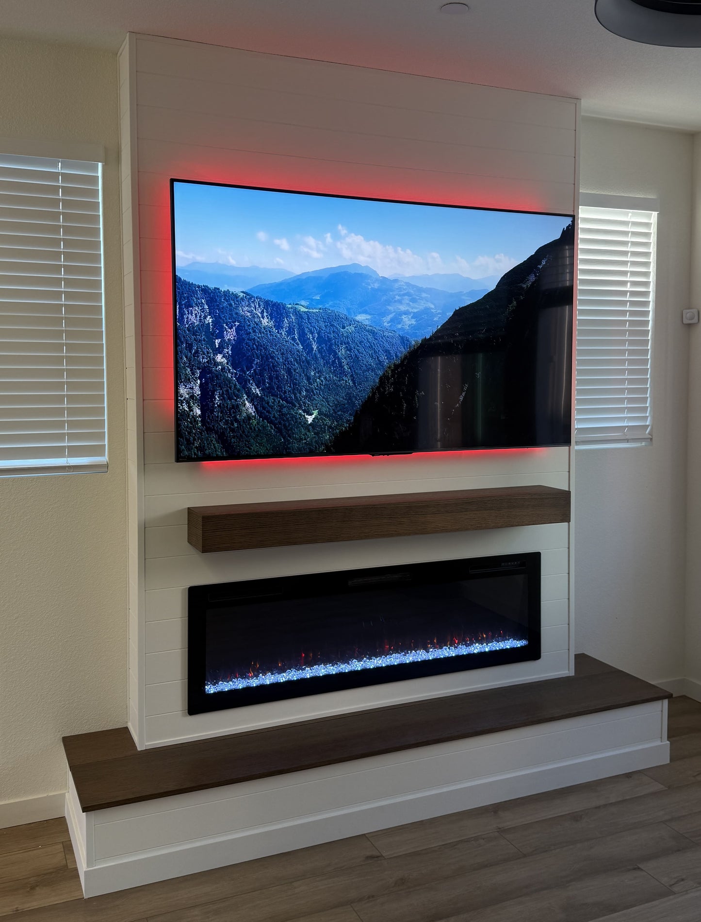 Luxury TV wall with fireplace feature