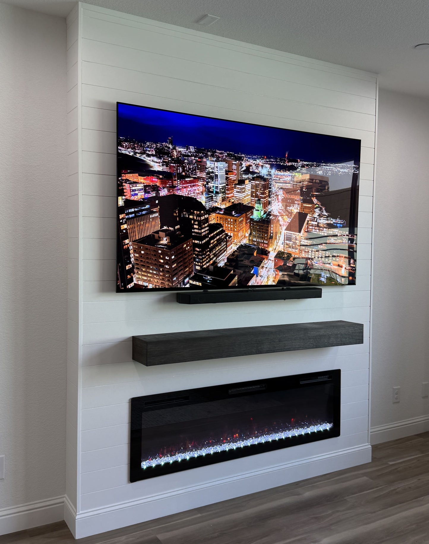 Open-plan living space with custom media wall