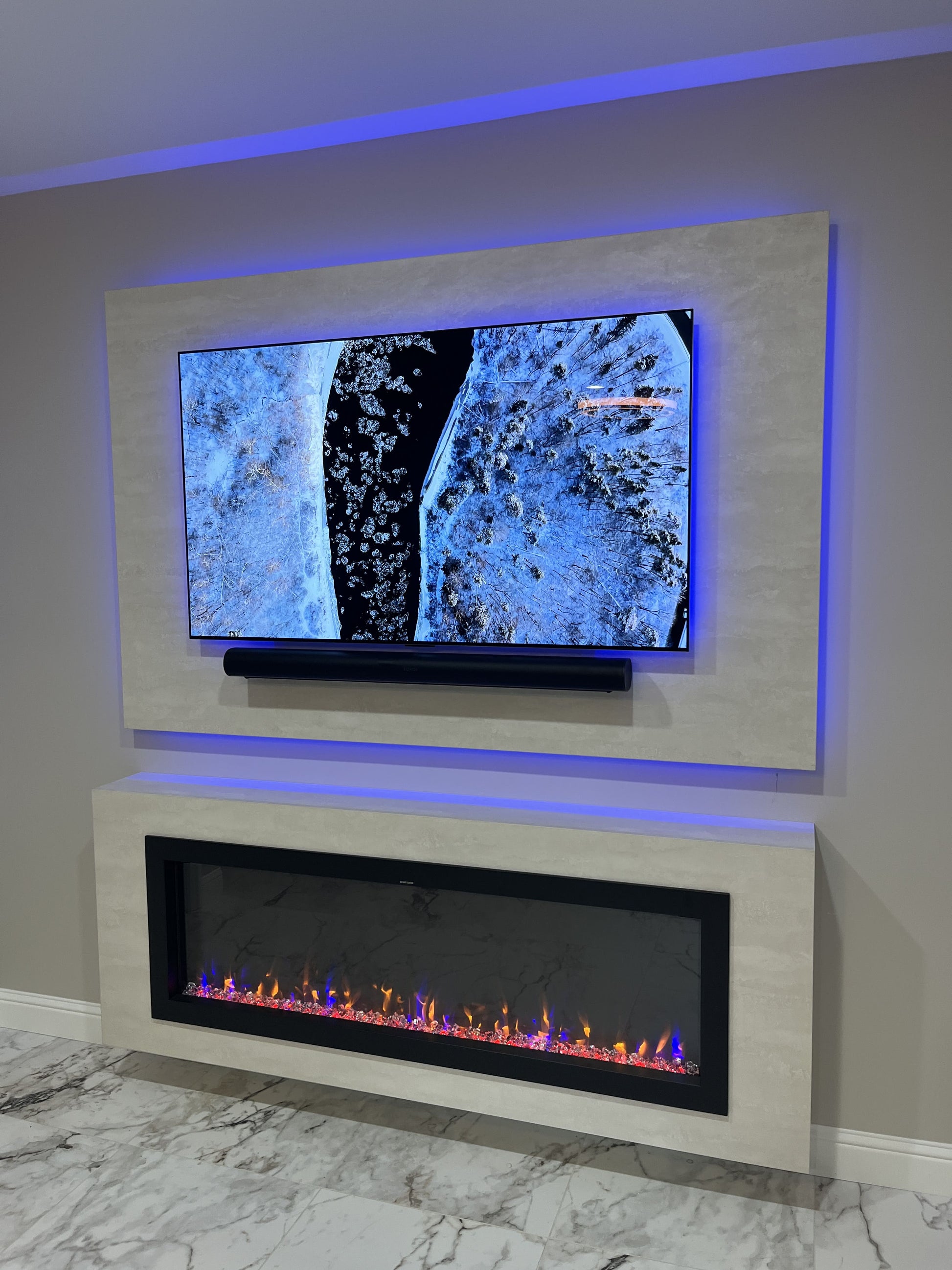 Backlit cabinets integrated into media wall