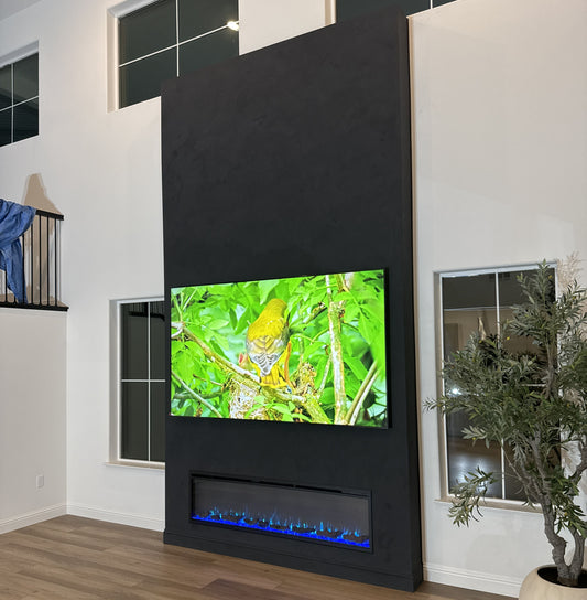 Luxury media wall combining TV and contemporary fireplace