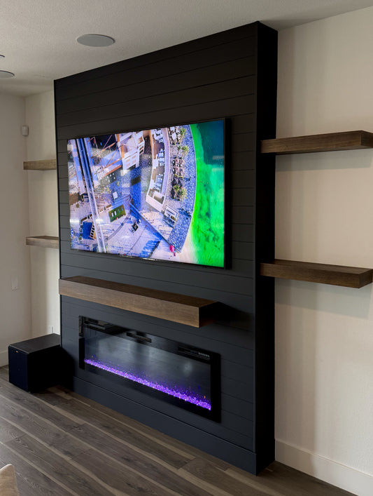 Wood-finish cabinets and custom entertainment wall