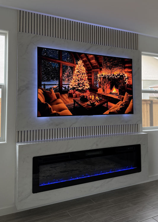 Marble-effect cabinetry and custom media wall