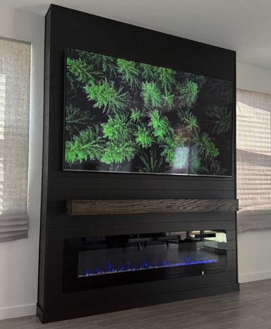 Custom media wall with hidden storage compartments