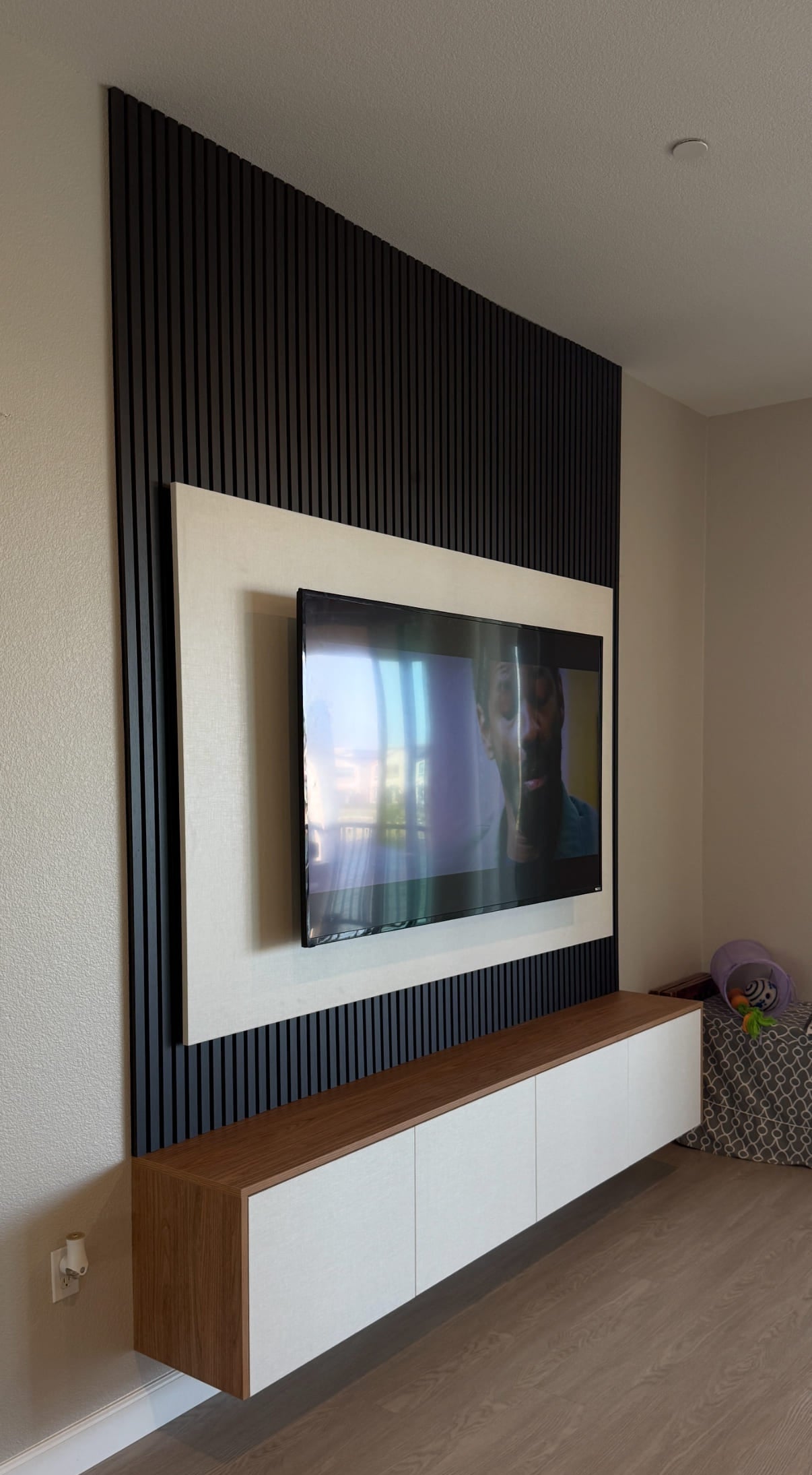 Custom-made cabinets with integrated TV unit