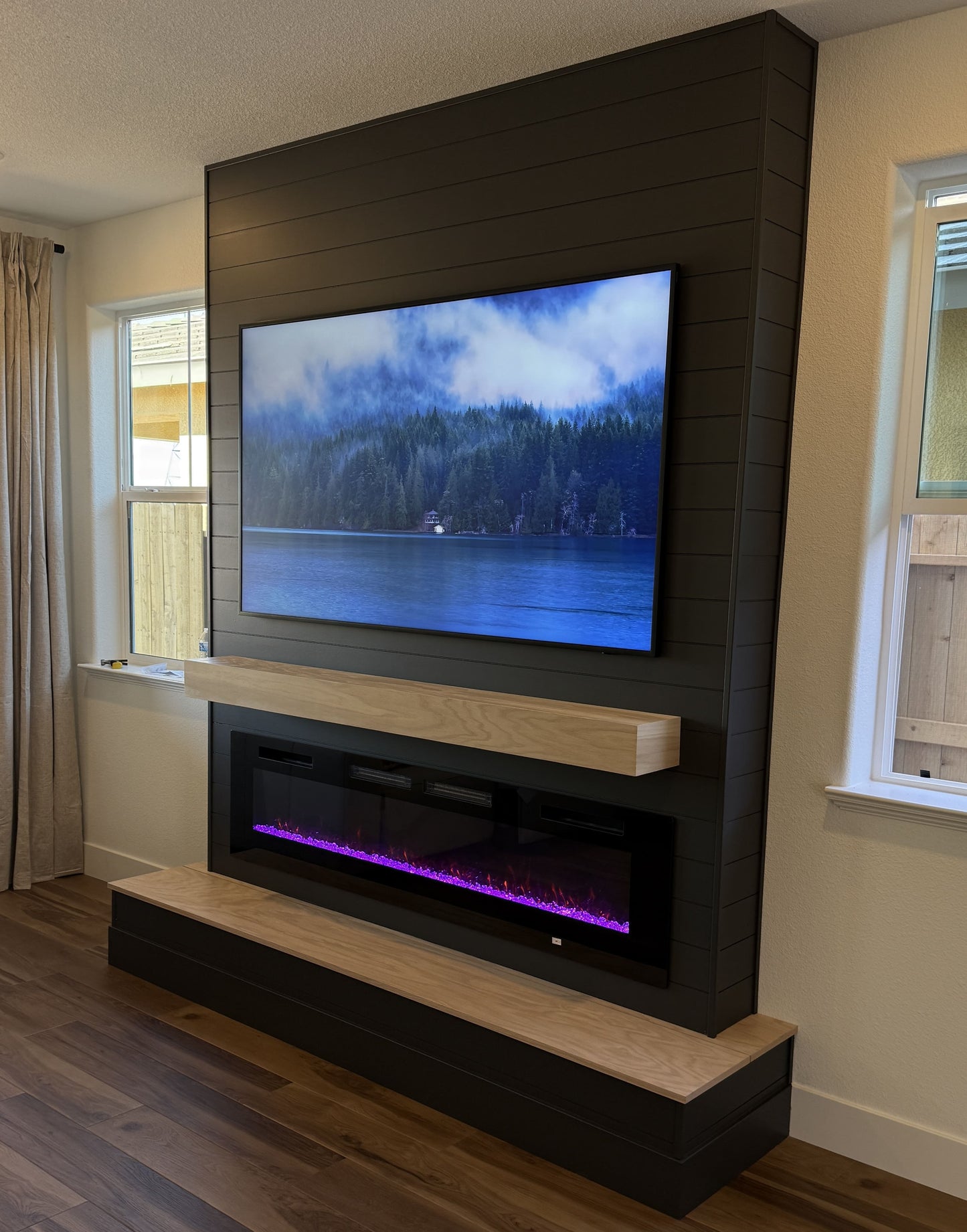 Custom entertainment wall with integrated drawers