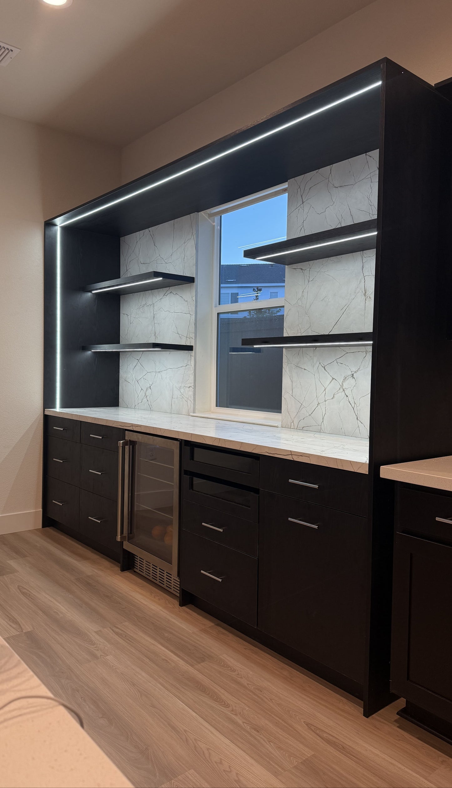 Stone-texture feature wall with built-in cabinets