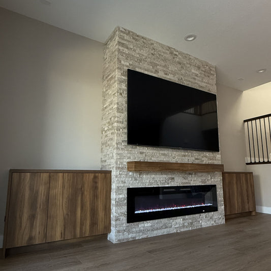 Bespoke entertainment wall with cabinets and fire feature