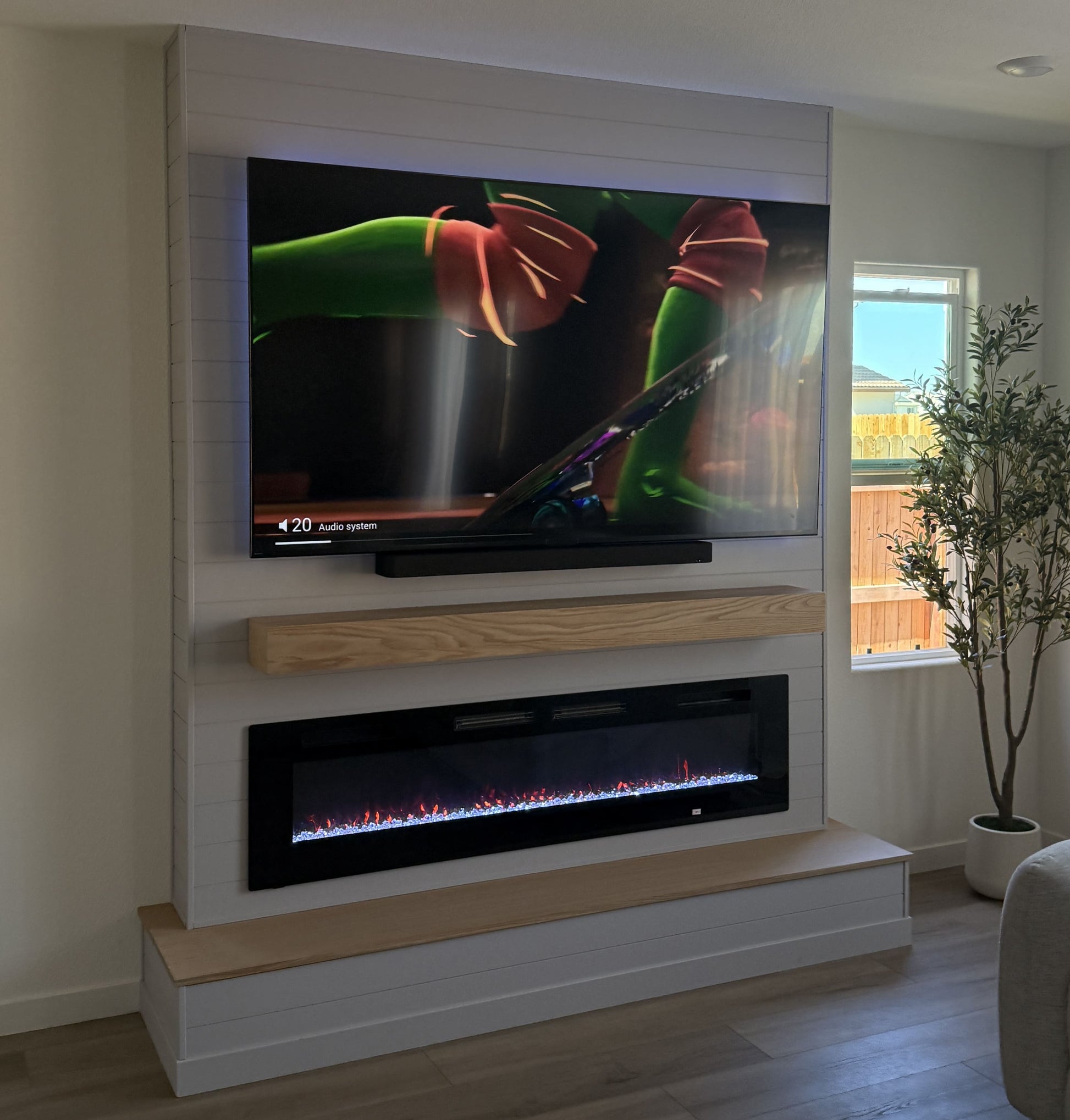 Custom media wall with soft ambient LED glow