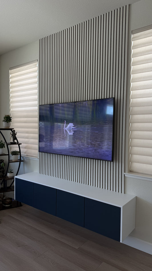 High-gloss white cabinetry with TV media wall