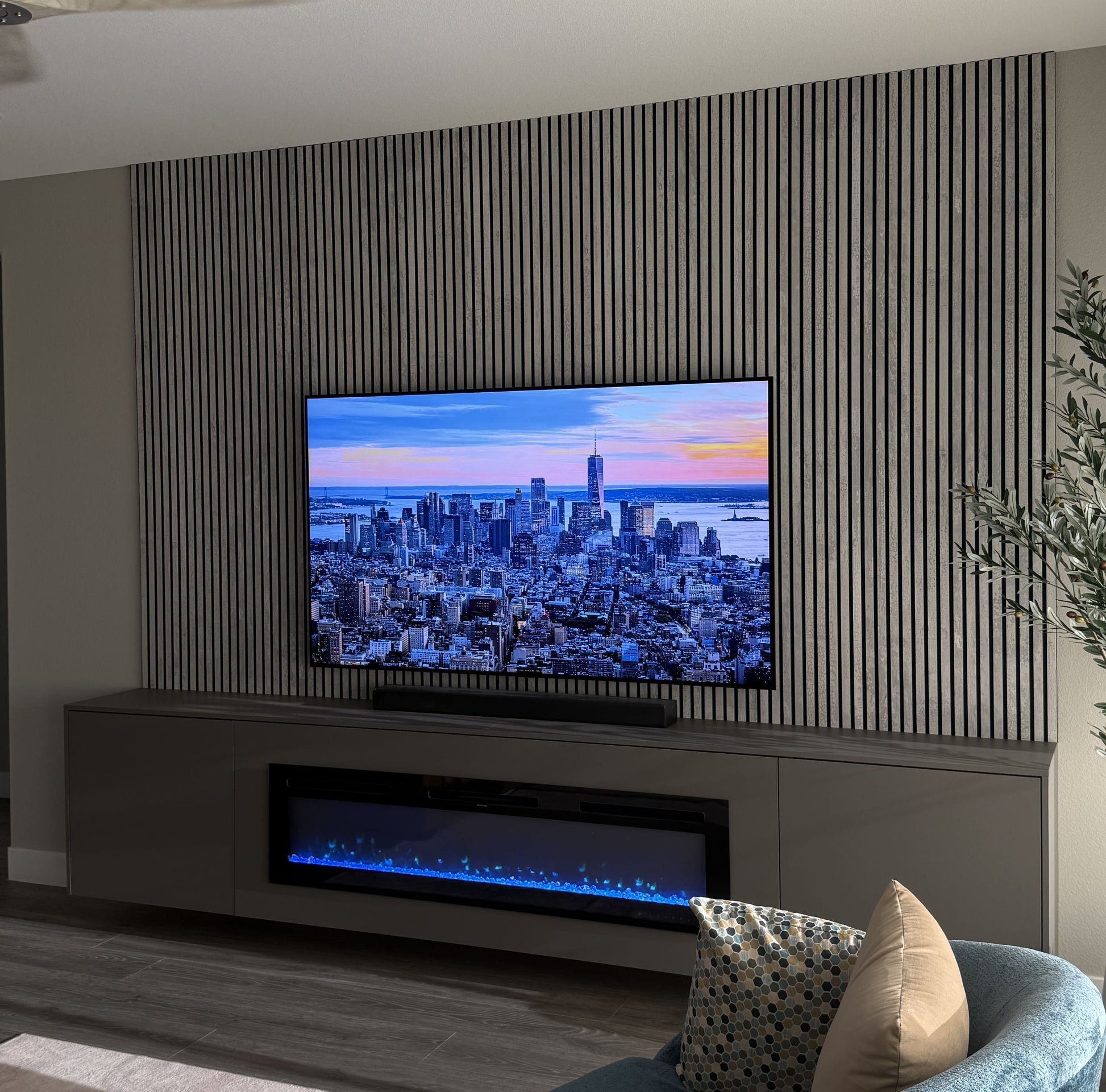 Custom media wall with ambient LED backlighting