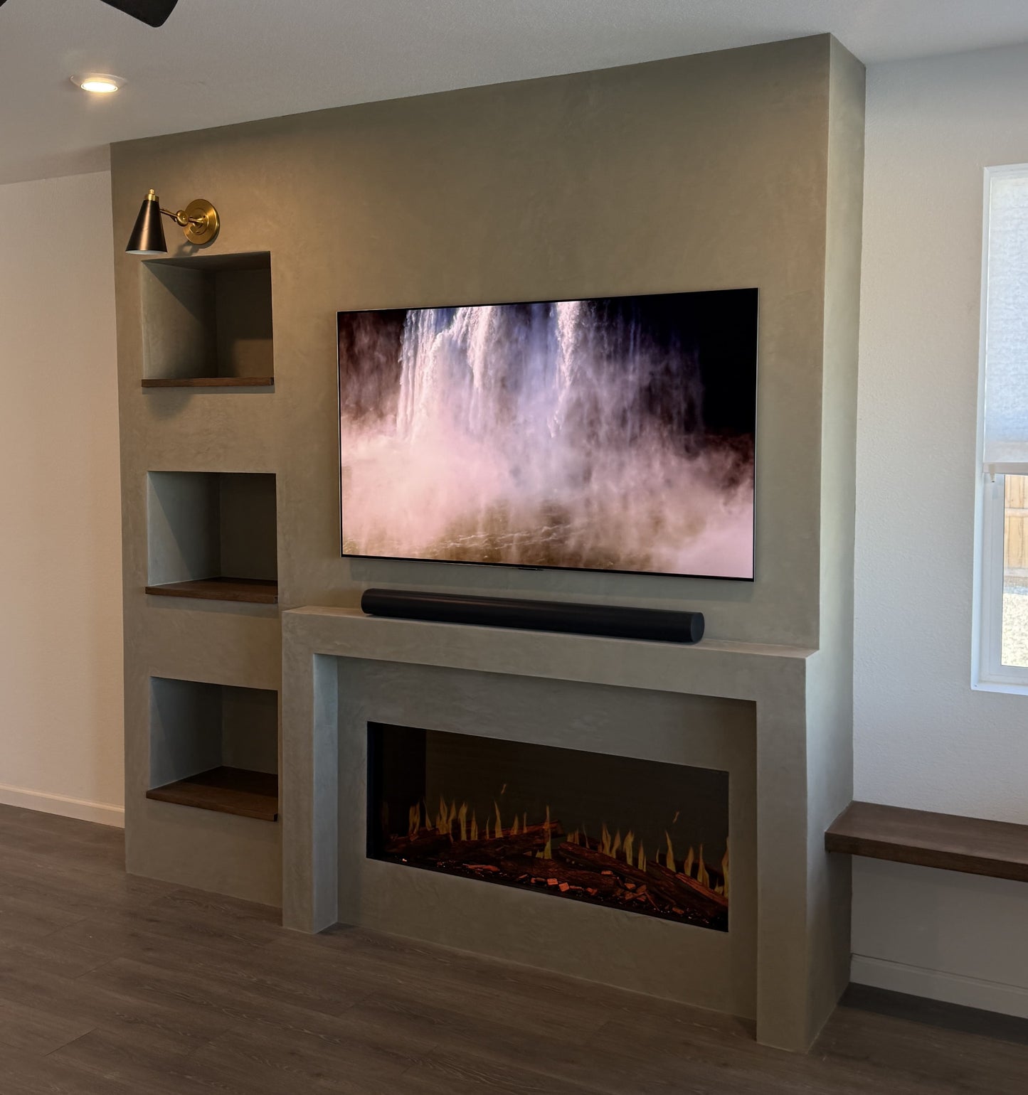 Modern TV wall with illuminated cabinets