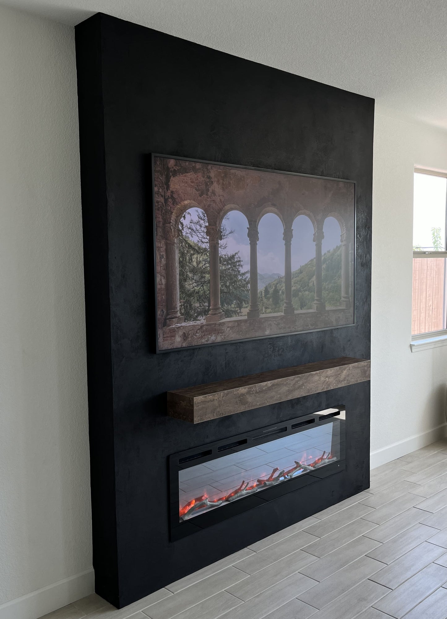 Designer TV wall in open-plan lounge