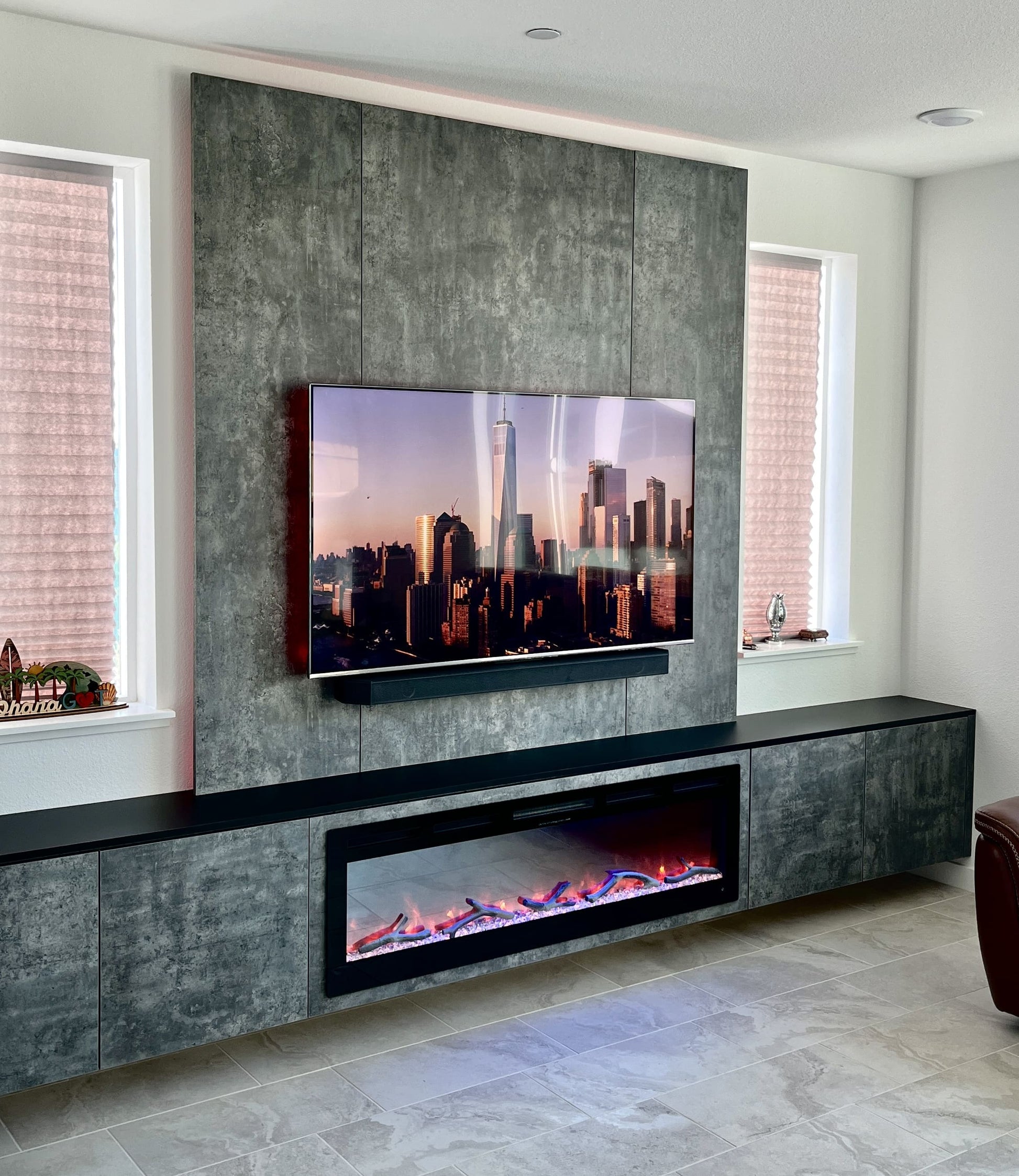 Wall-to-wall cabinetry with built-in television