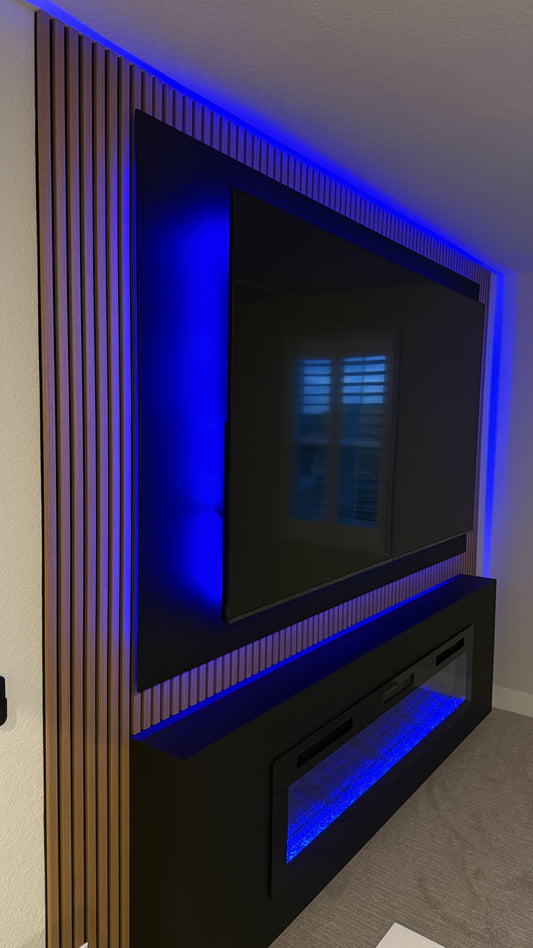 Modern lounge featuring bespoke TV wall unit