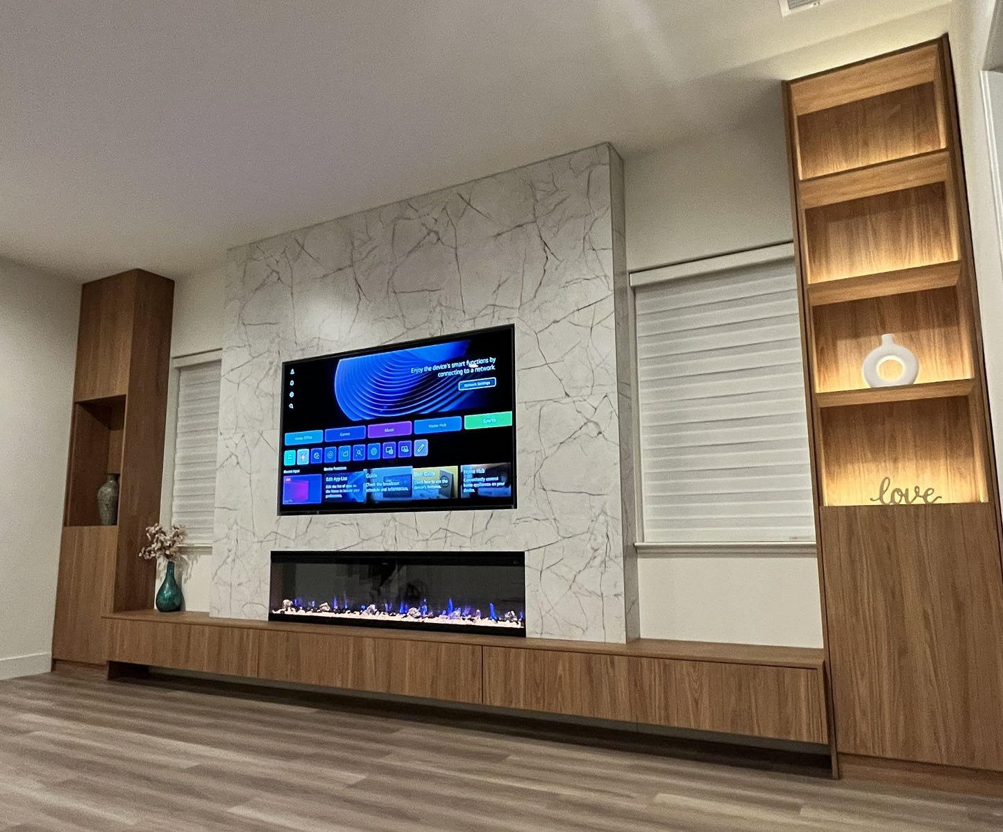 Luxury cabinetry and TV feature wall