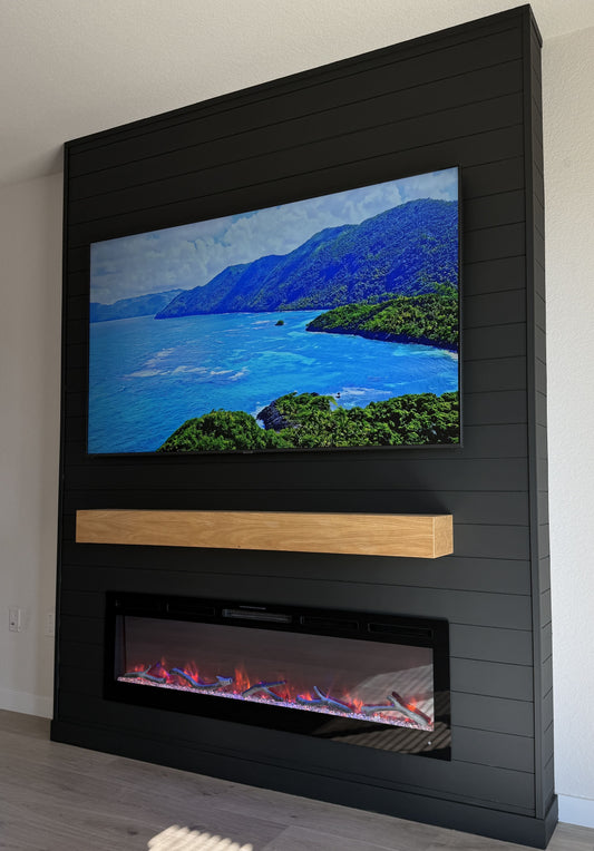 Modern lounge featuring bespoke TV wall unit