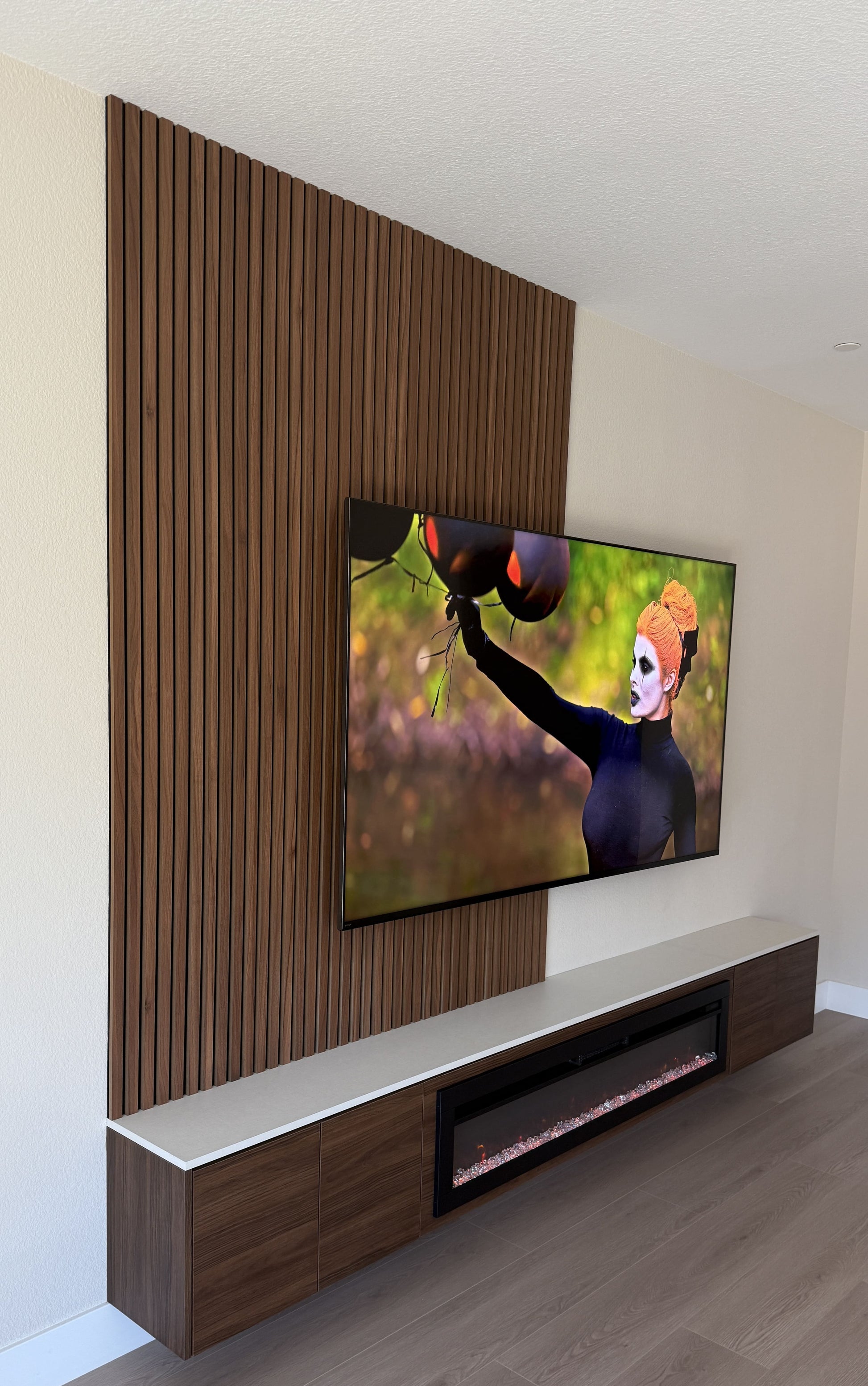 Media wall with integrated drawers and shelving