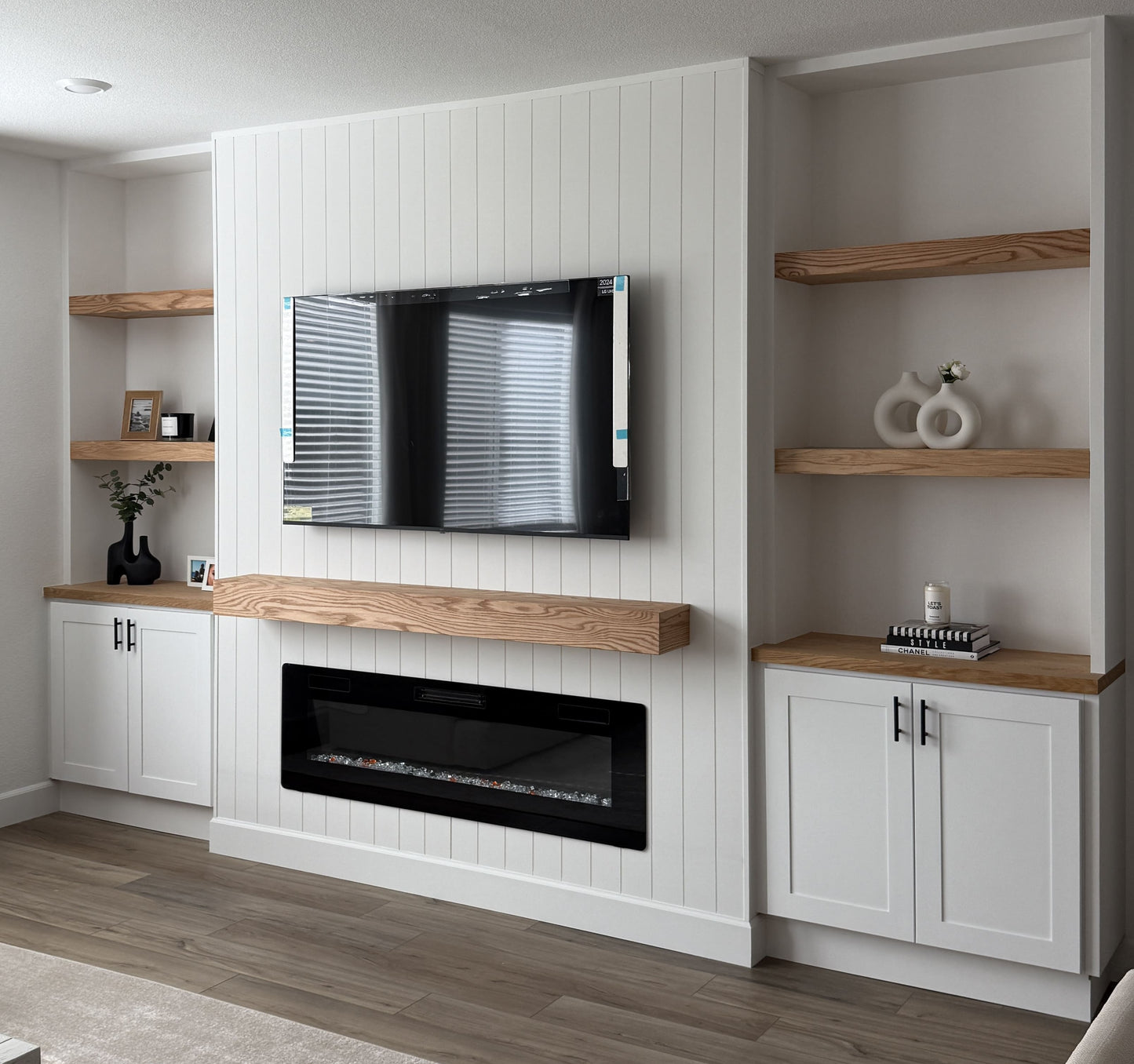 Built-in cabinets surrounding media wall