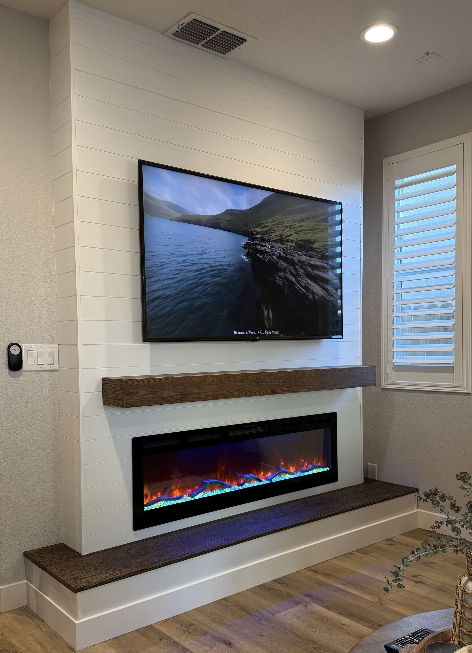 Backlit bespoke media wall with mounted TV