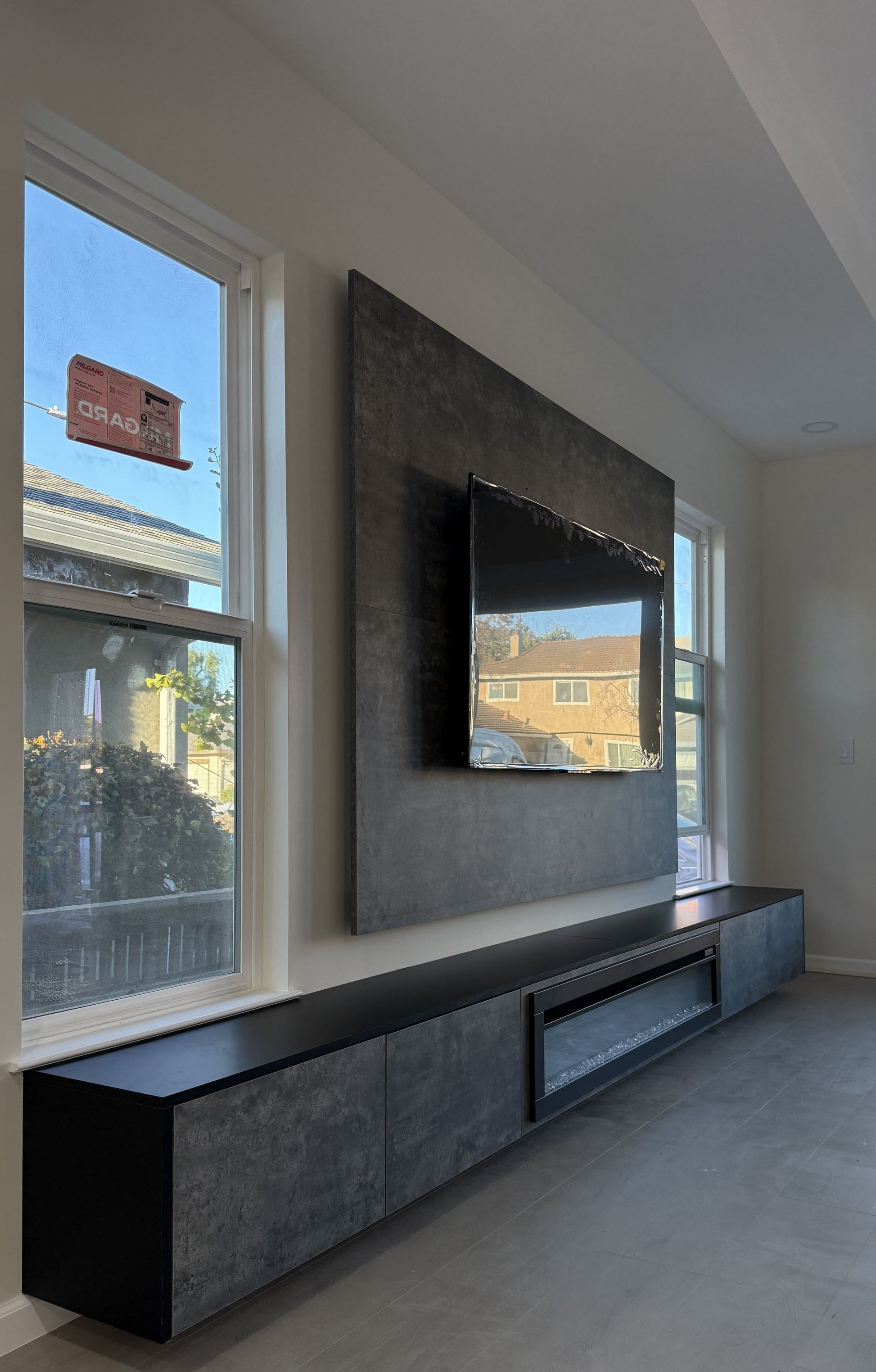 Contemporary cabinetry with custom media wall