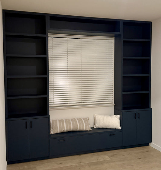 Modern matte cabinetry with integrated TV wall