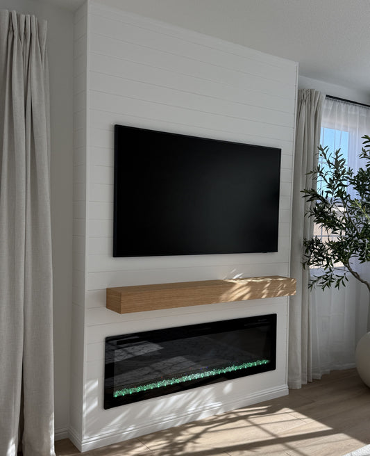 TV wall with recessed LED strip lighting
