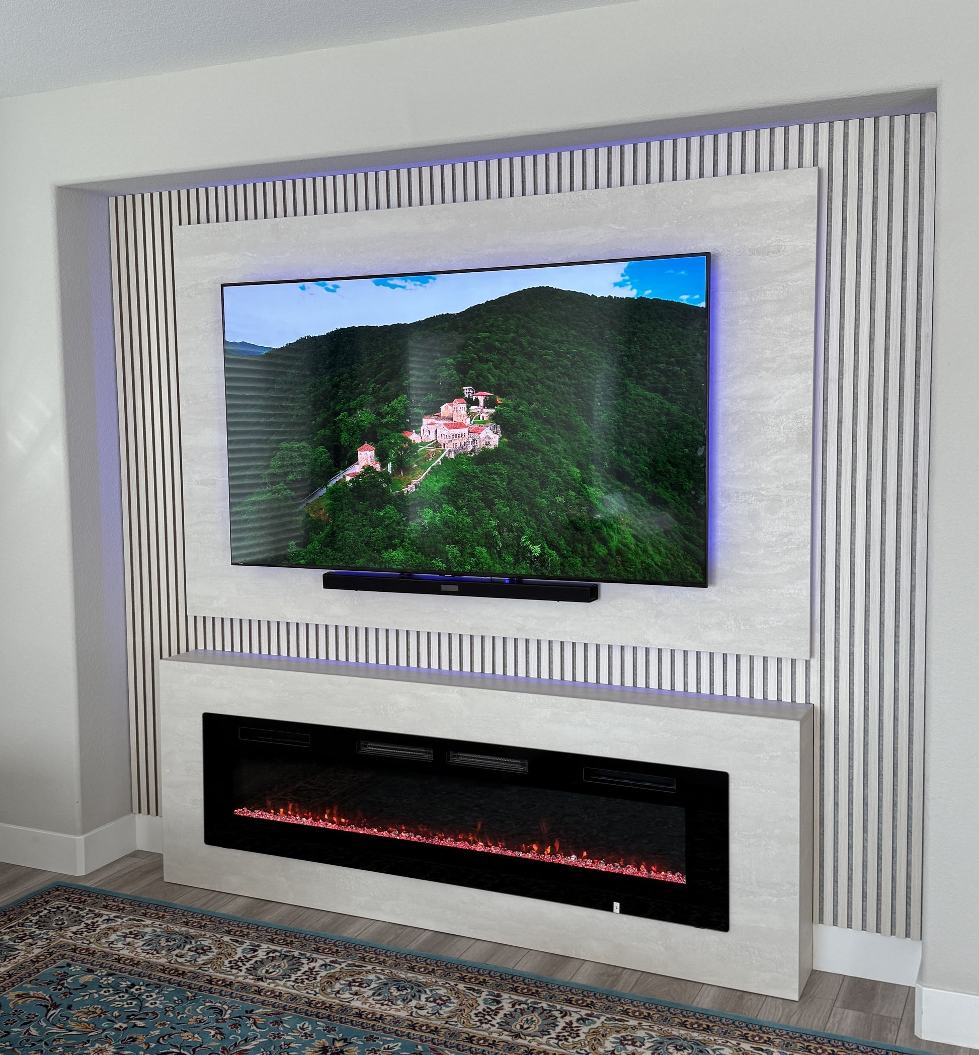 Minimalist custom media wall with clean lines and neutral tones