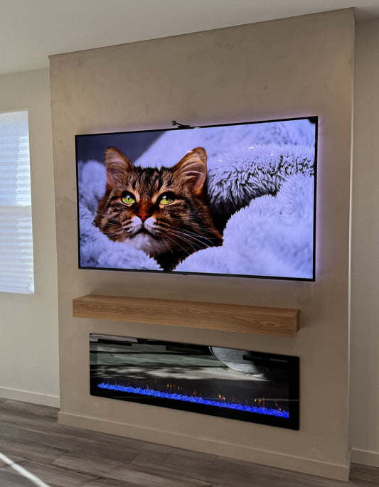 Modern media wall combining TV and fireplace