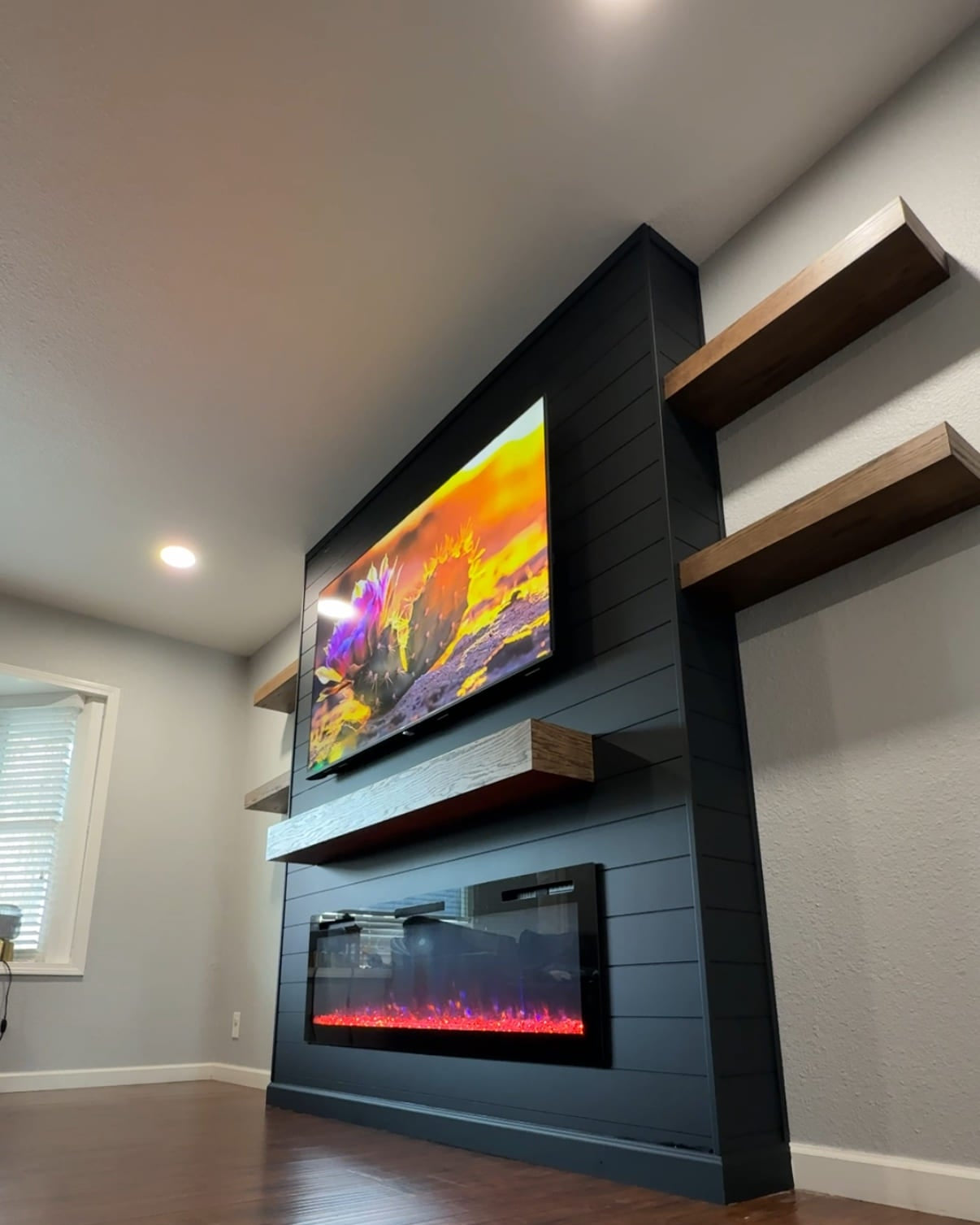 Custom-built TV wall with matching cabinets